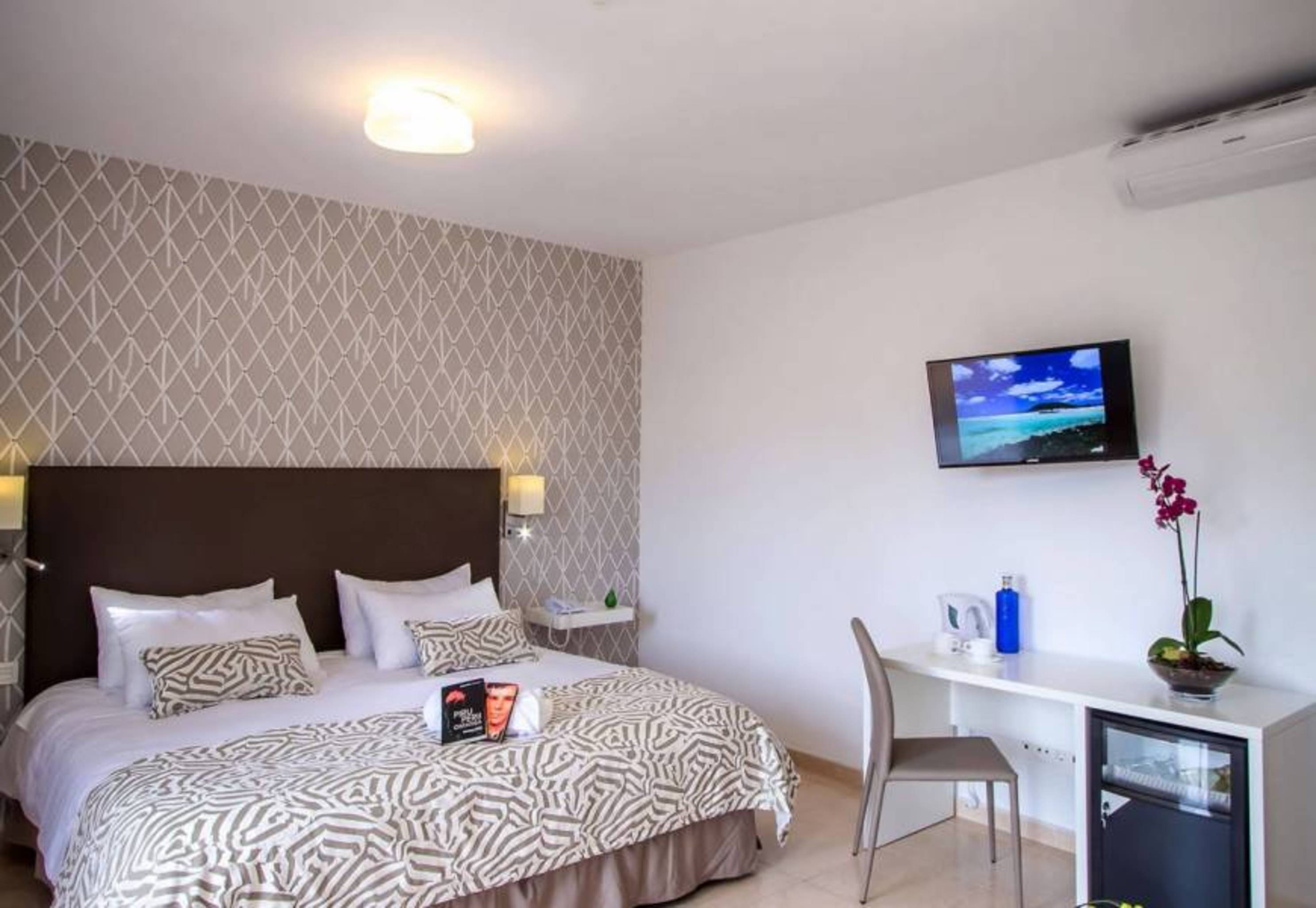 غرفة بسرير مزدوج أو سريرين منفصلين، Hotel Arena Suite - Adults Only 2/10
