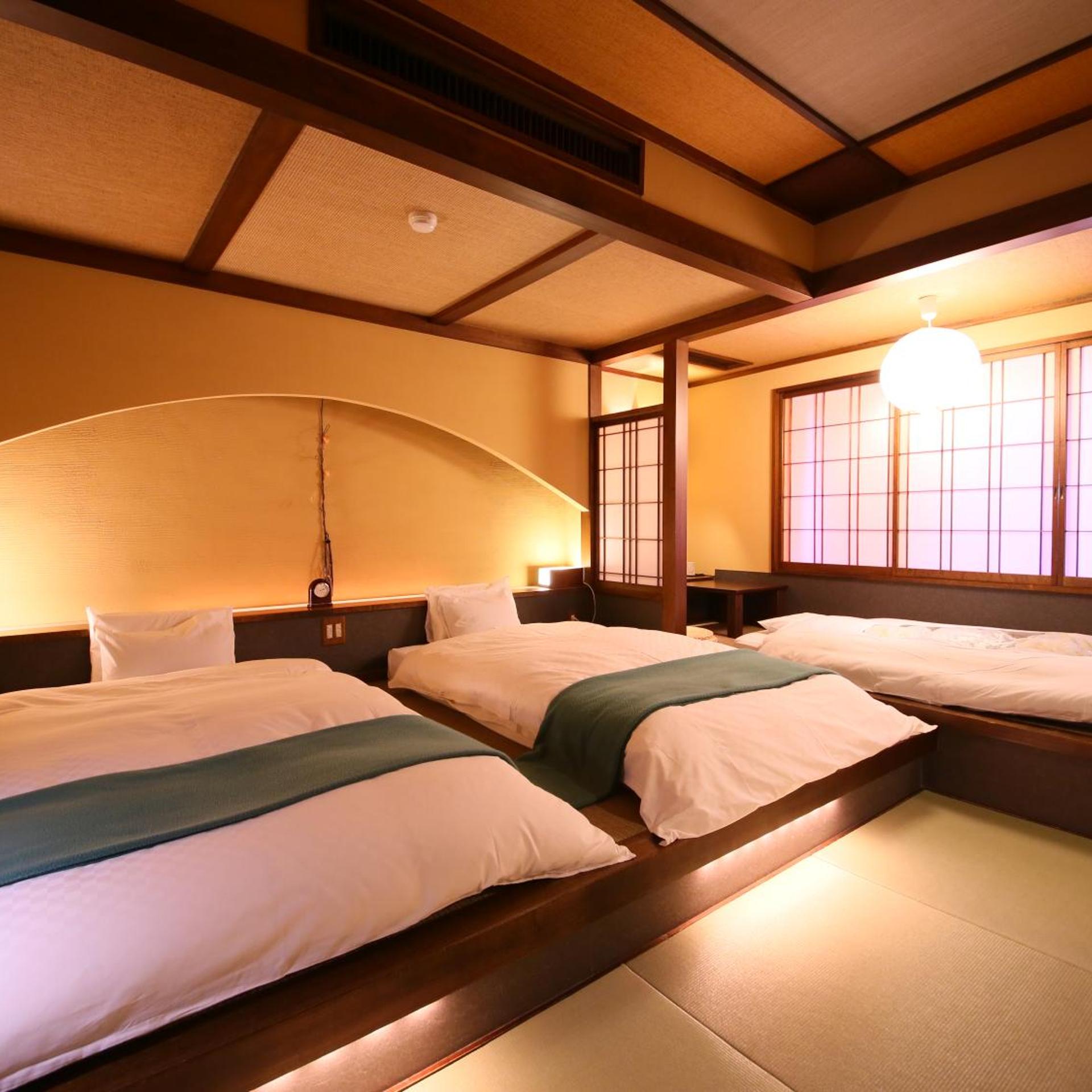 غرفة بسريرين منفصلين بأرضية تاتامي، Hotel Tamanoyu 6/10