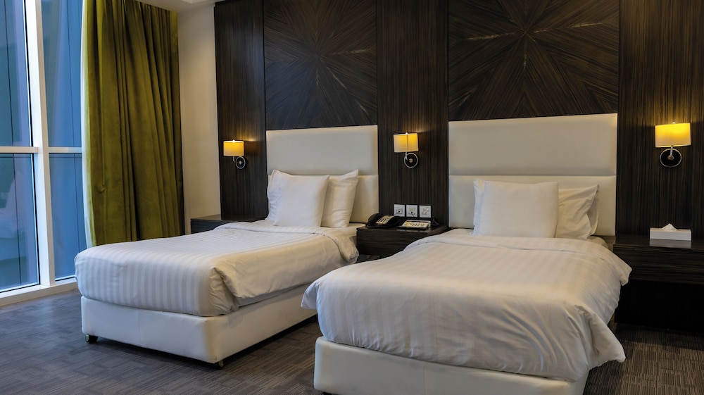 DELUXE, TWIN BEDS