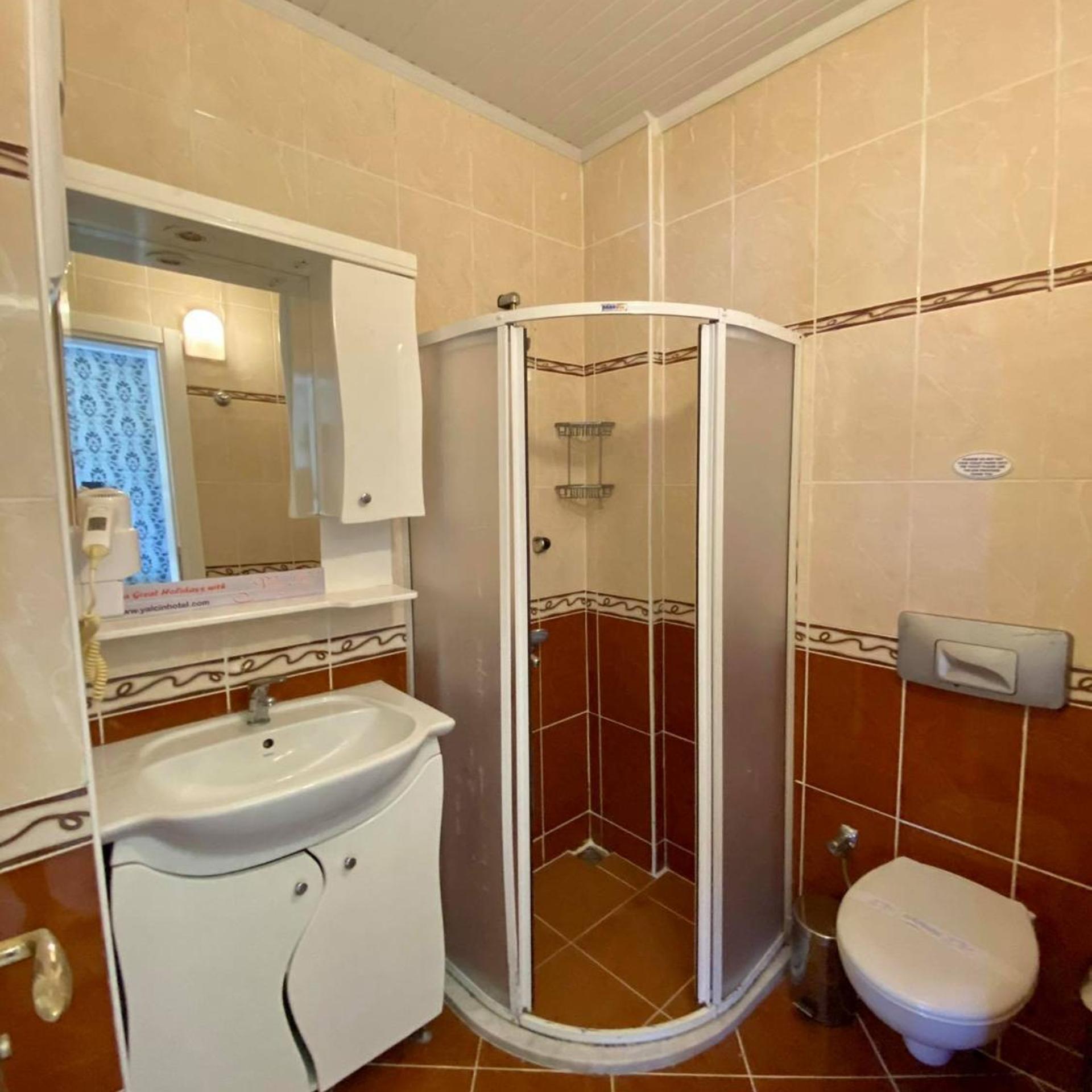 Erkan Tumen Yalcin Hotel 45/50