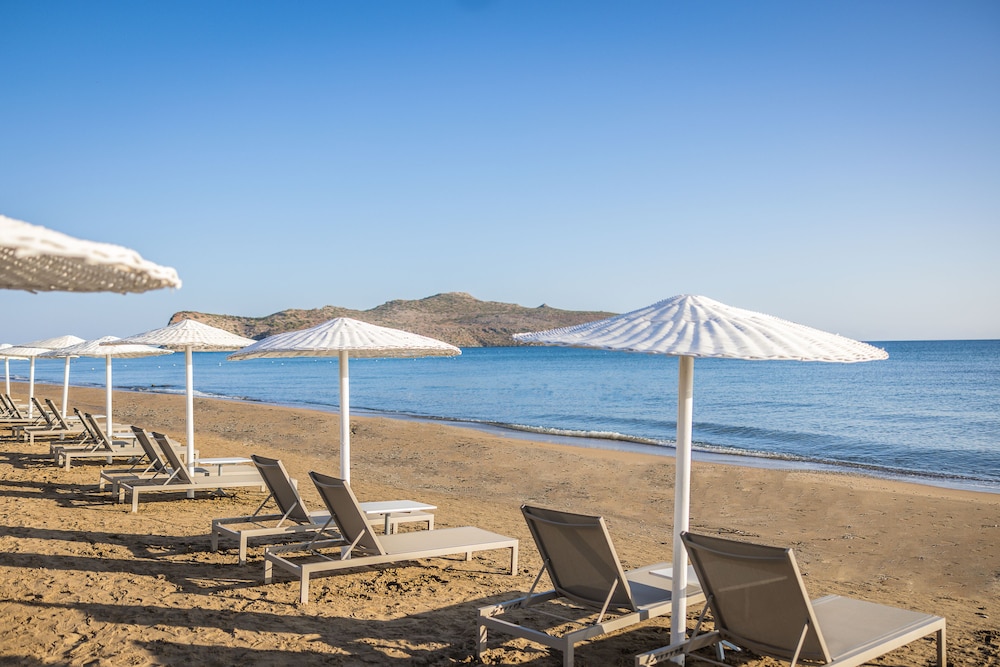 Giannoulis - Santa Marina Beach Hotel 69/77