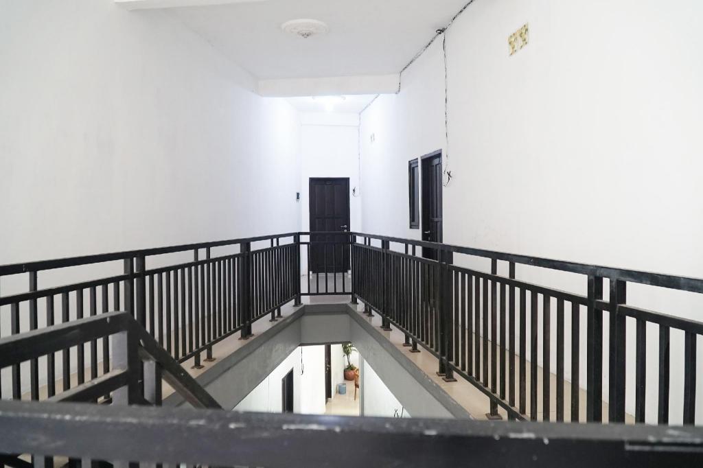 OYO 1034 Pondok Mulia Guest House 30/33