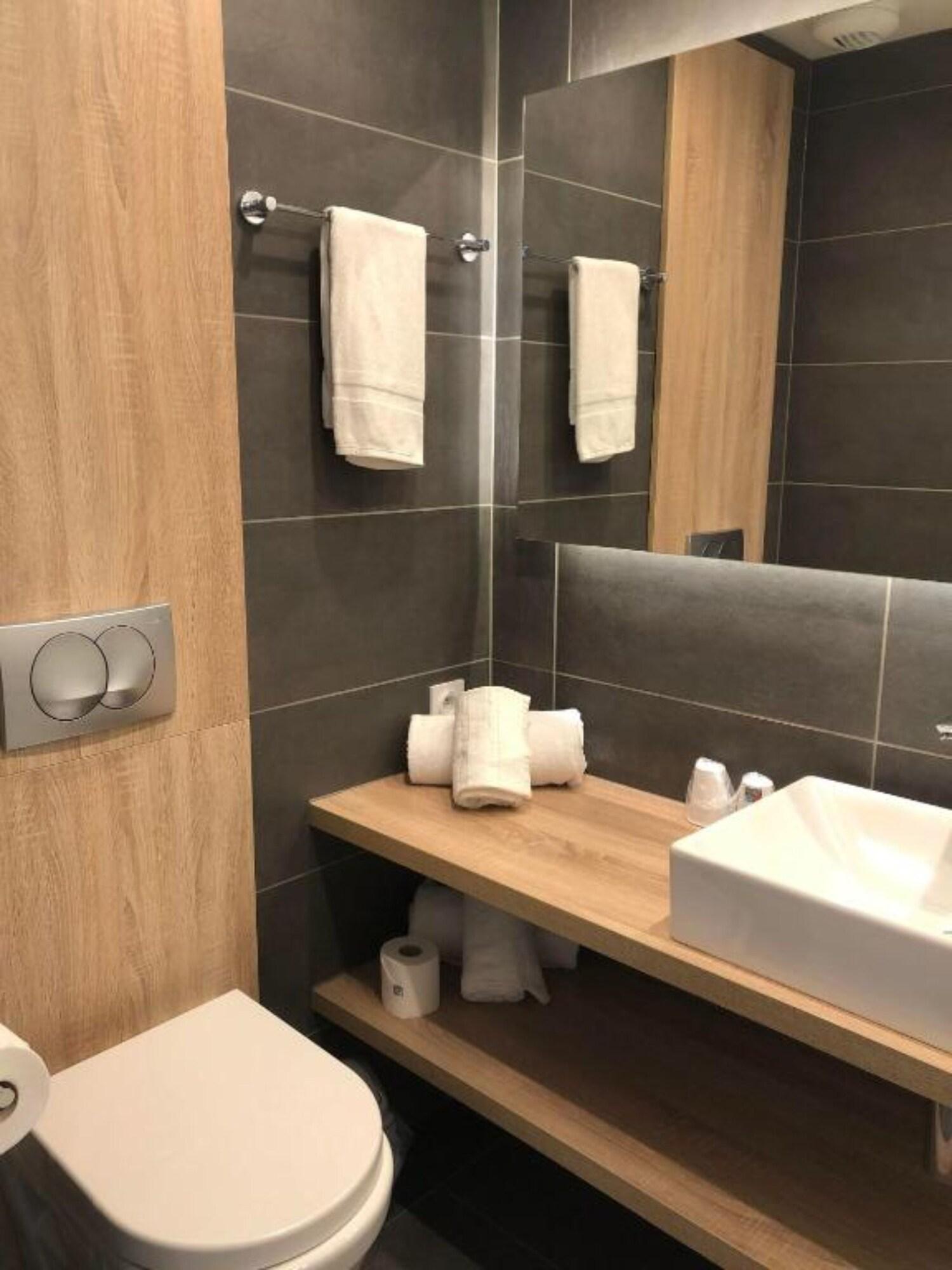 غرفة بسرير مزدوج أو سريرين منفصلين، Lagrange Apart Hotel - Les Jardins de l Olympie 4/4