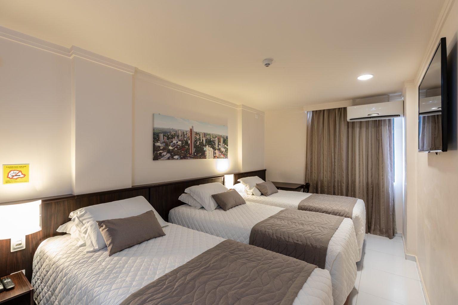 Deluxe, Triple, Twin Beds