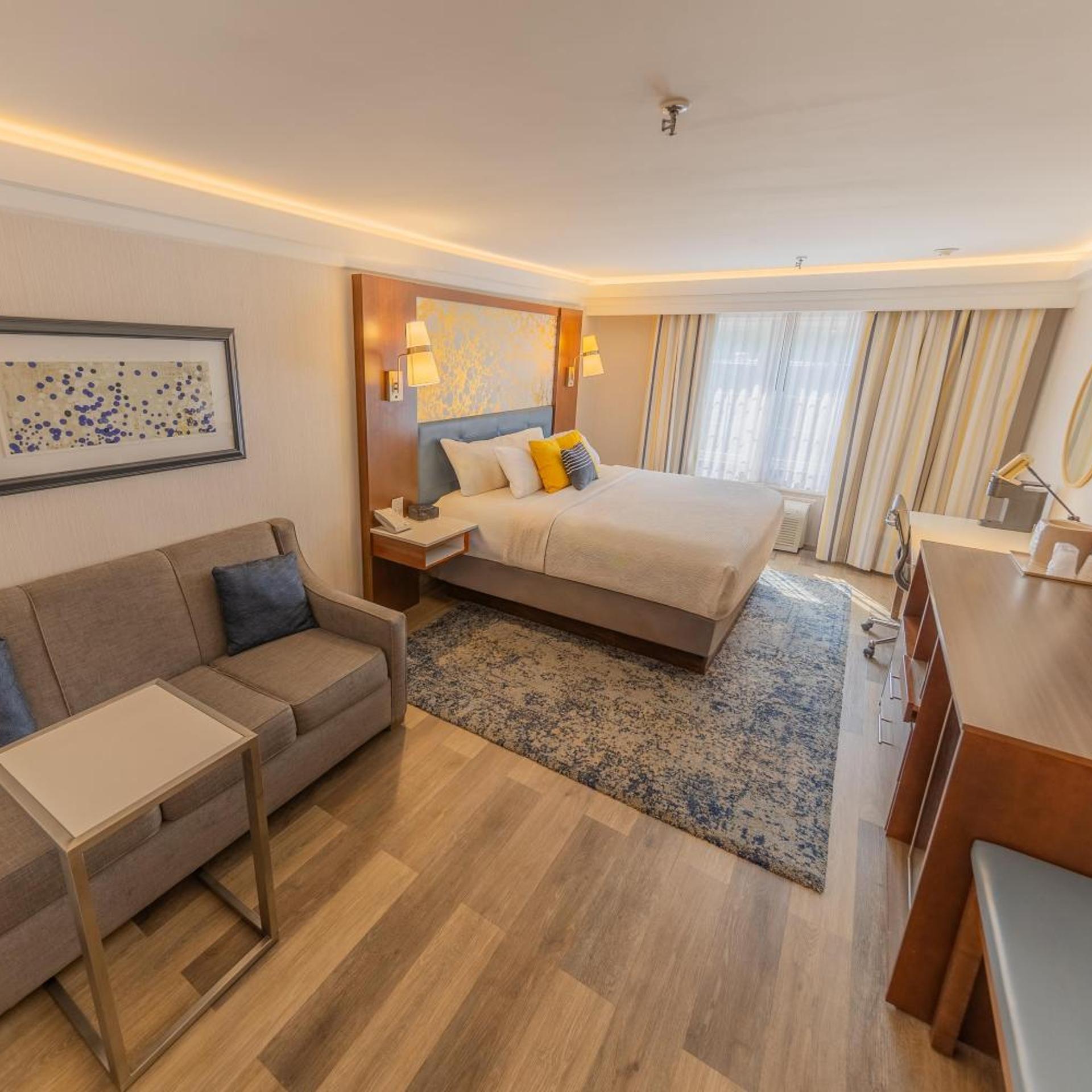 جناح بسرير كينج مع أريكة، The Westfield Inn, BW Signature Collection 6/9