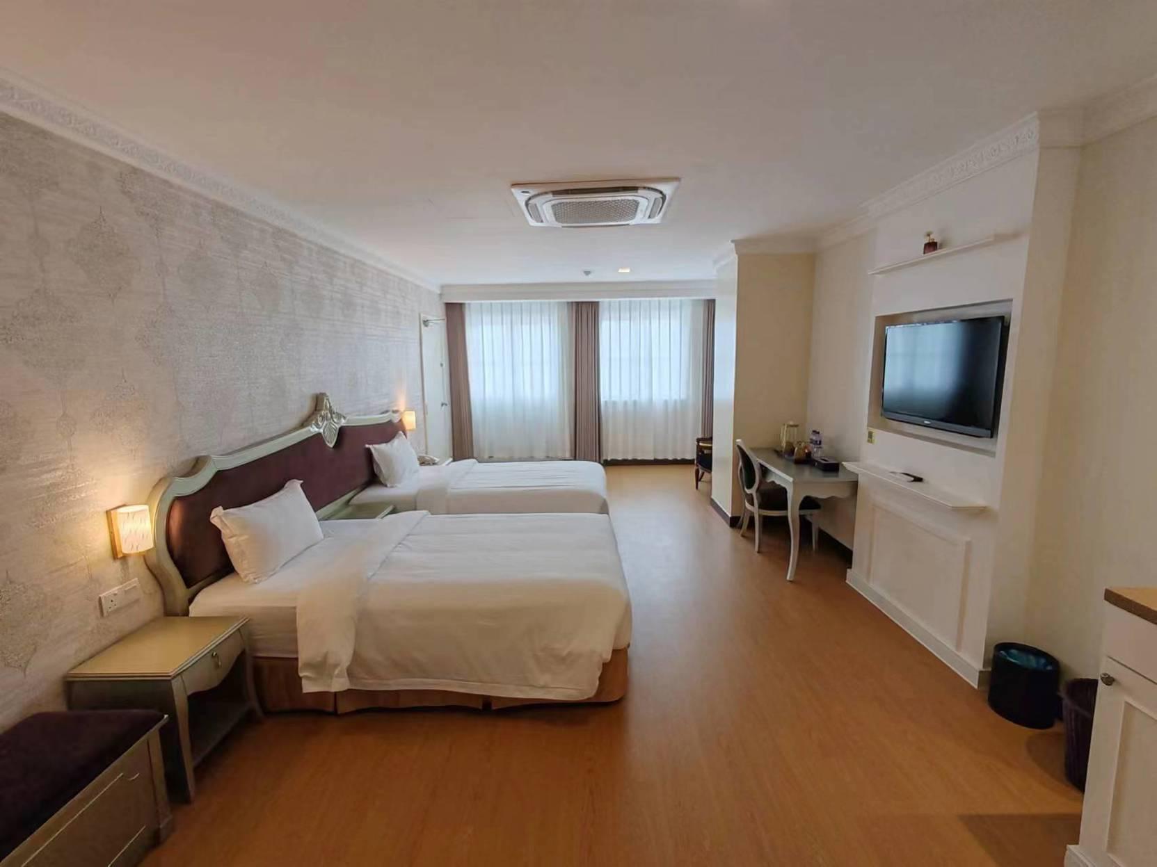 غرفة تنفيذية ديلوكس بسريرين منفصلين، RC Hotel 2/2