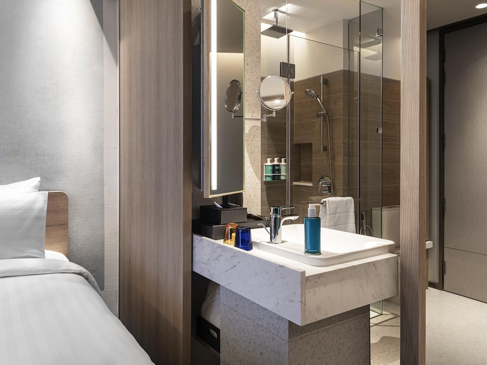 غرفة ديلوكس ركنية بسريرين منفصلين، Novotel Future Park Rangsit 7/8