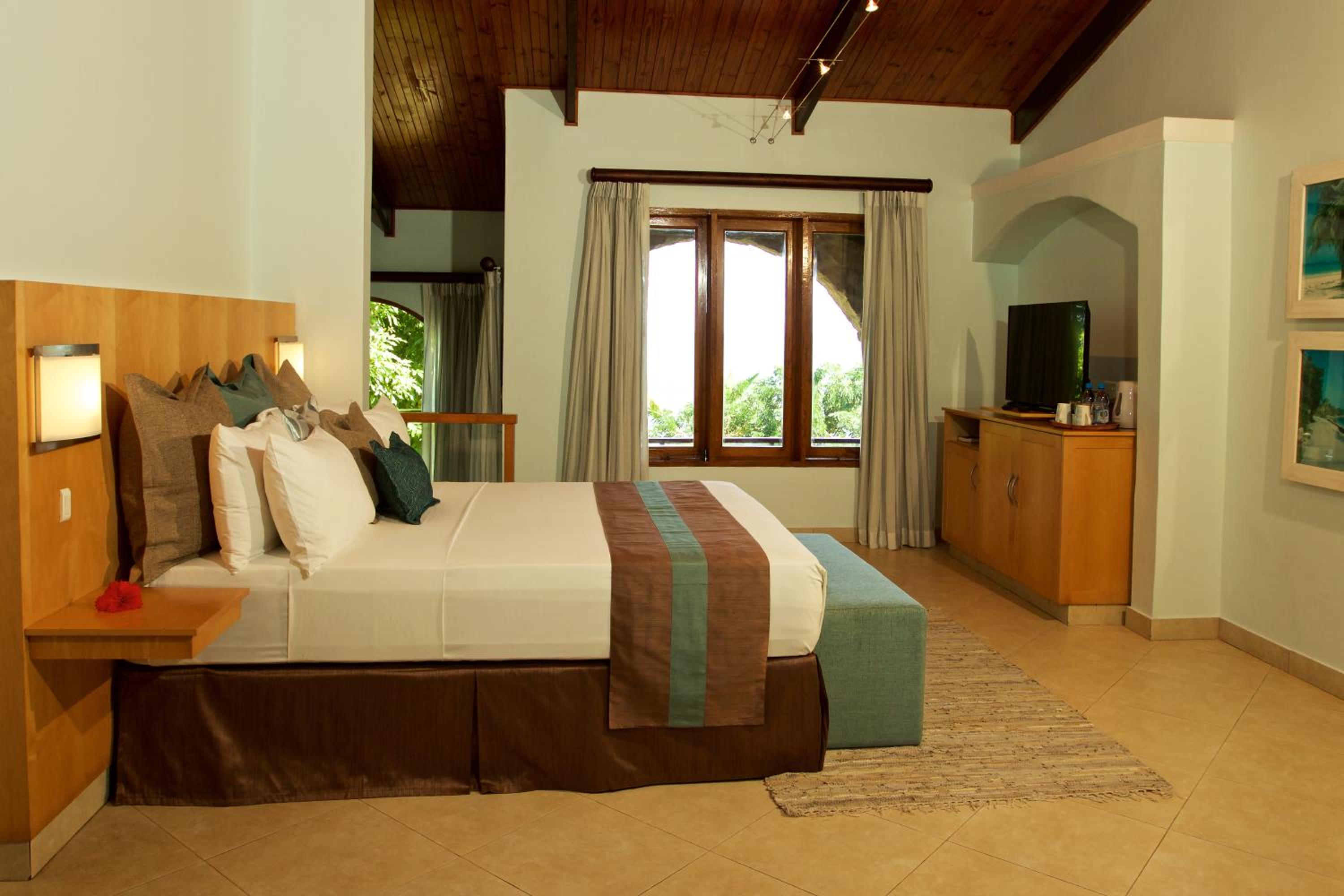 غرفة قياسية بسرير كوين، Coco de Mer Hotel and Black Parrot Suites 4/10