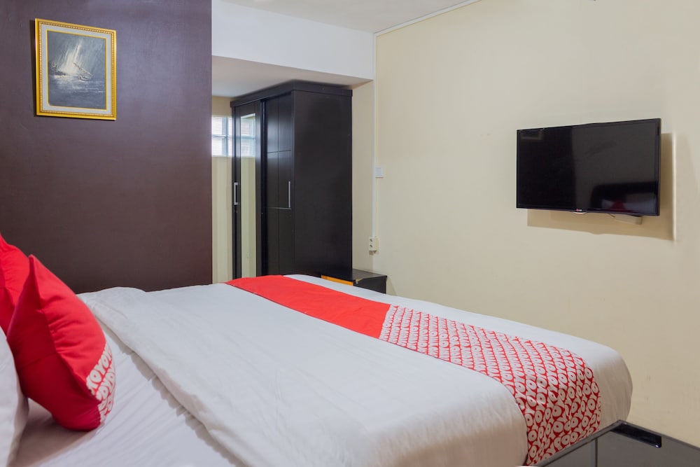 Oyo 989 Audah Guesthouse Syariah 14/36