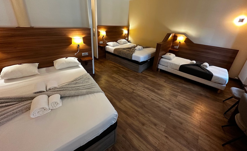 Family, 1 Single and 2 Double Beds