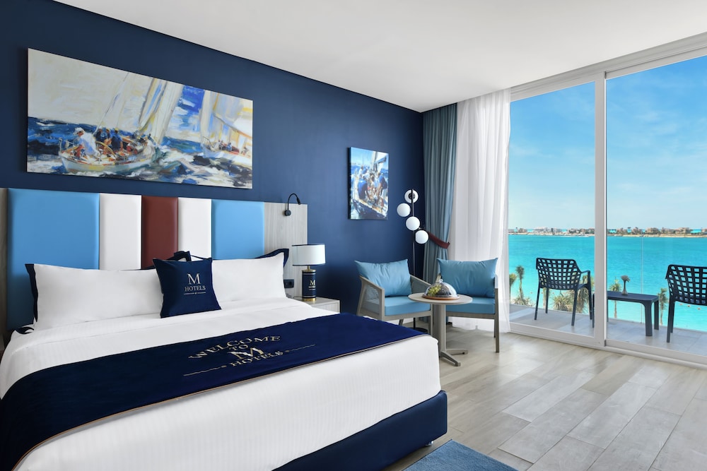 غرفة تنفيذية بسريرين منفصلين بإطلالة على البحر، M Hotels at Porto Marina 2/4
