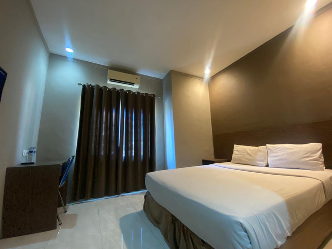 غرفة ديلوكس بسرير كينج للمدخنين، Hotel Artha Kencana 2/4