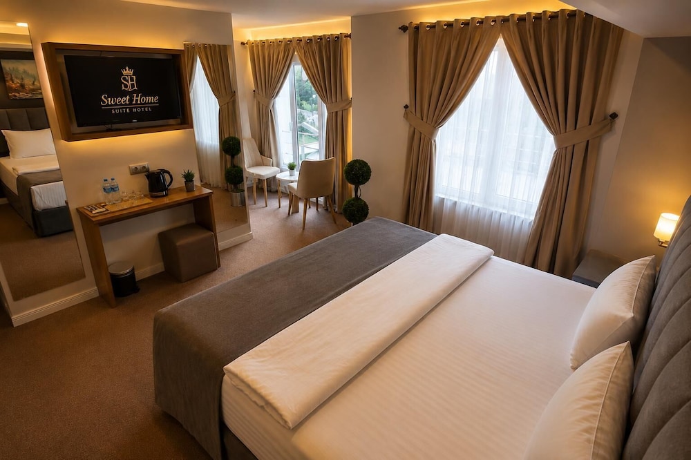 غرفة ملكية بسرير كوين بإطلالة على الحديقة، Sweet Home Suite Hotel 6/8