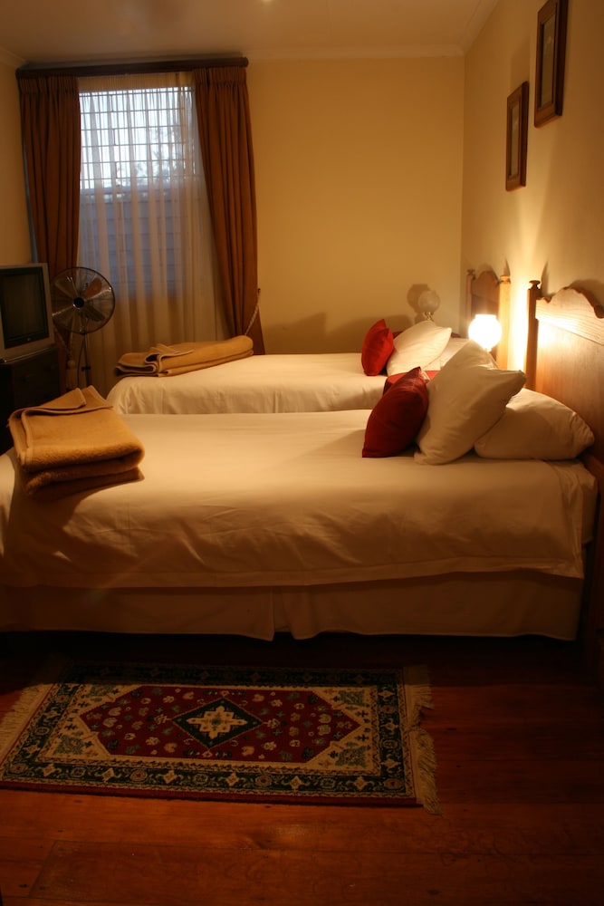 غرفة بسريرين منفصلين، Knysna Manor House 2/8
