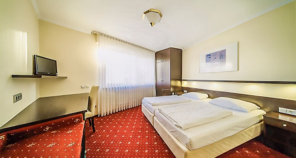 PLAZA INN Rieker Stuttgart Hauptbahnhof 27/65