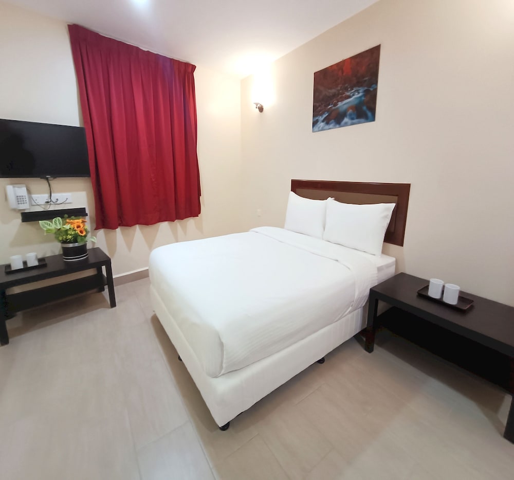 Capital O 90897 Island City Hotel 27/50