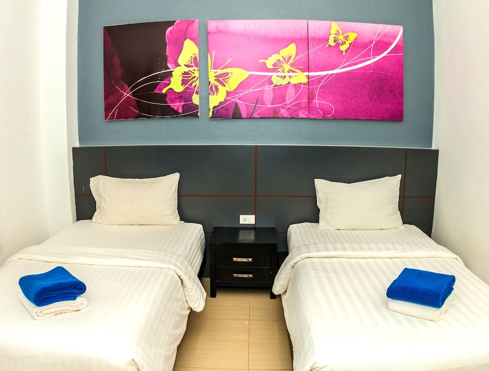 جناح عائلي بسرير كوين وسريرين منفصلين بإطلالة على البحر بغرفتي نوم، Lanta Sport Resort 3/10