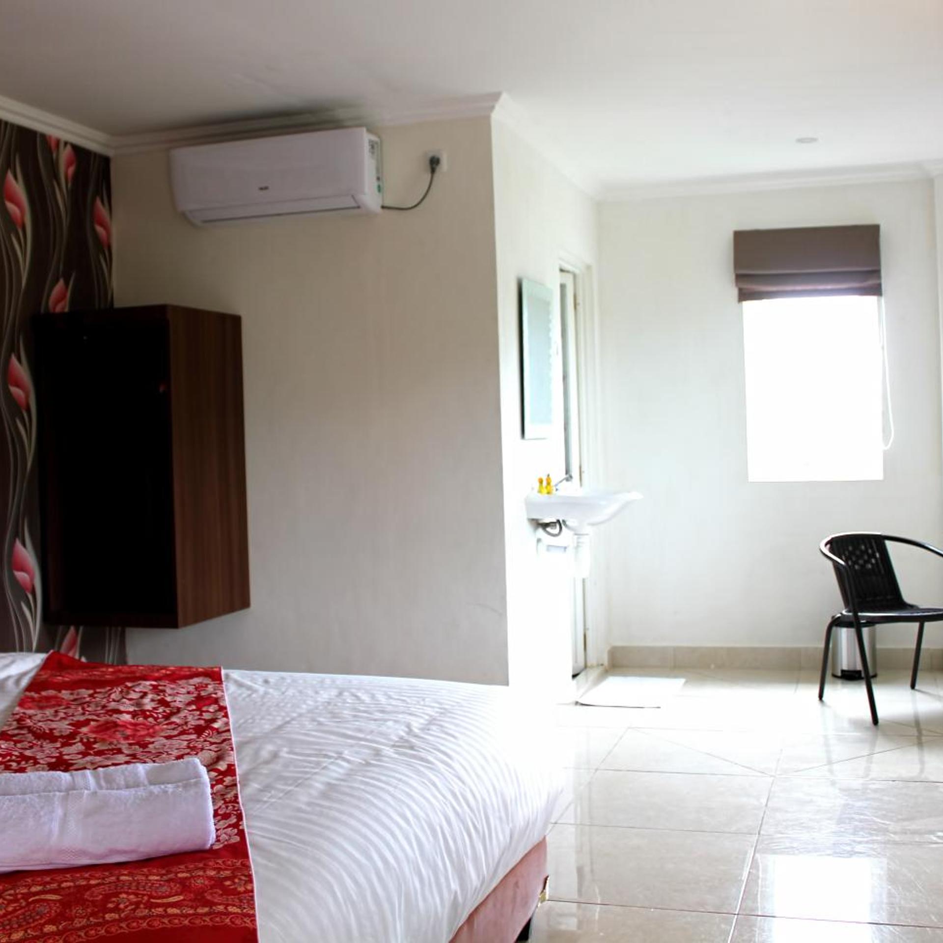 غرفة تنفيذية بسريرين منفصلين، Mel's Inn Manado 2/3