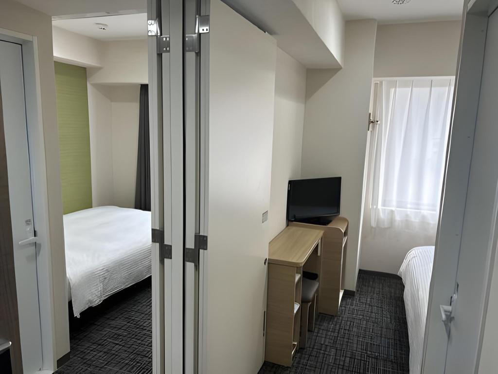 غرفة متصلة بسريرين منفصلين، R&B Hotel Nagoya Shinkansen-guchi 2/2