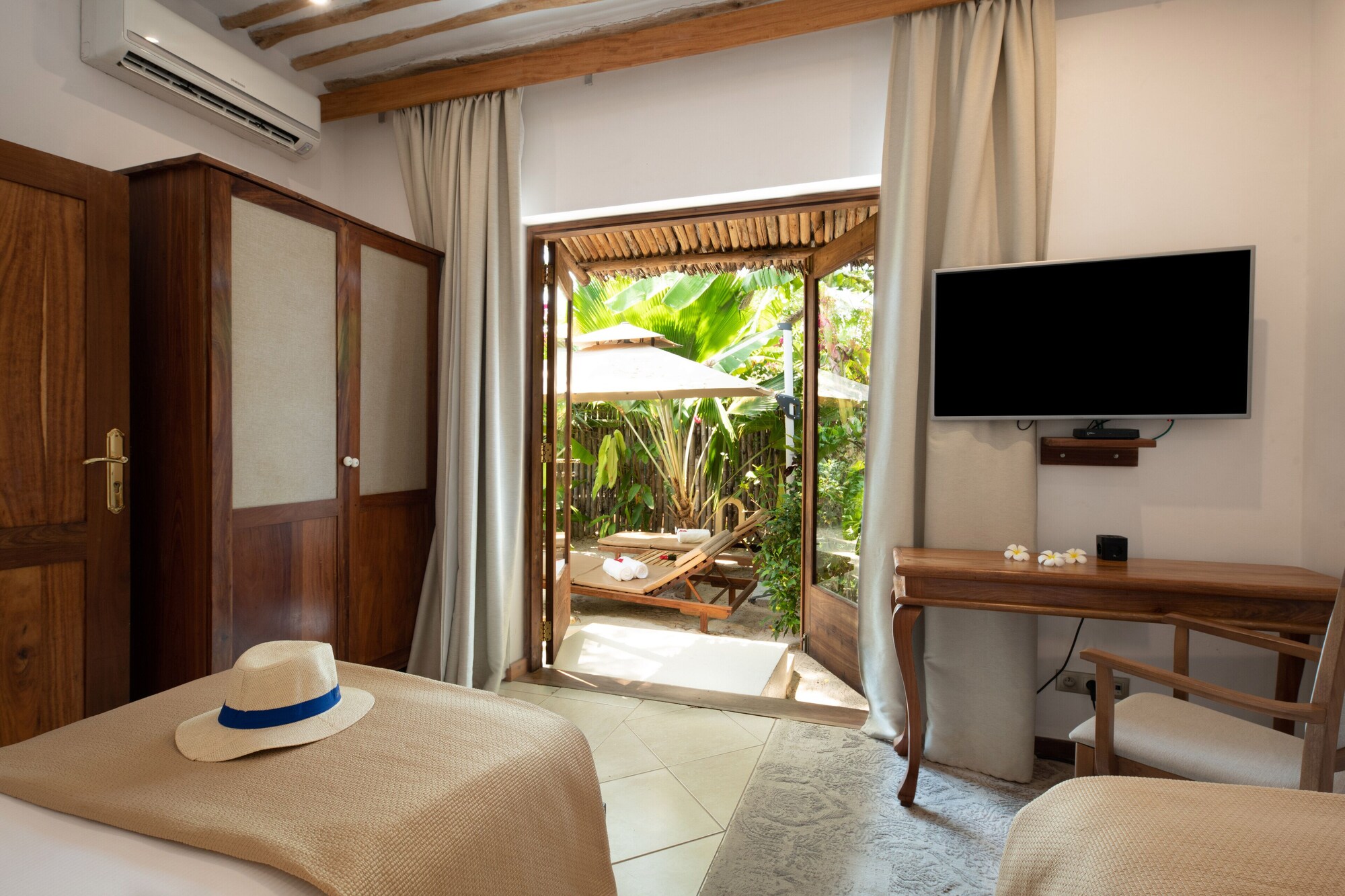 2 Bedrooms, Quadruple, Twin Beds, Pool Access, Garden Area، Zanzibar White Sand Luxury Villas Spa 7/10