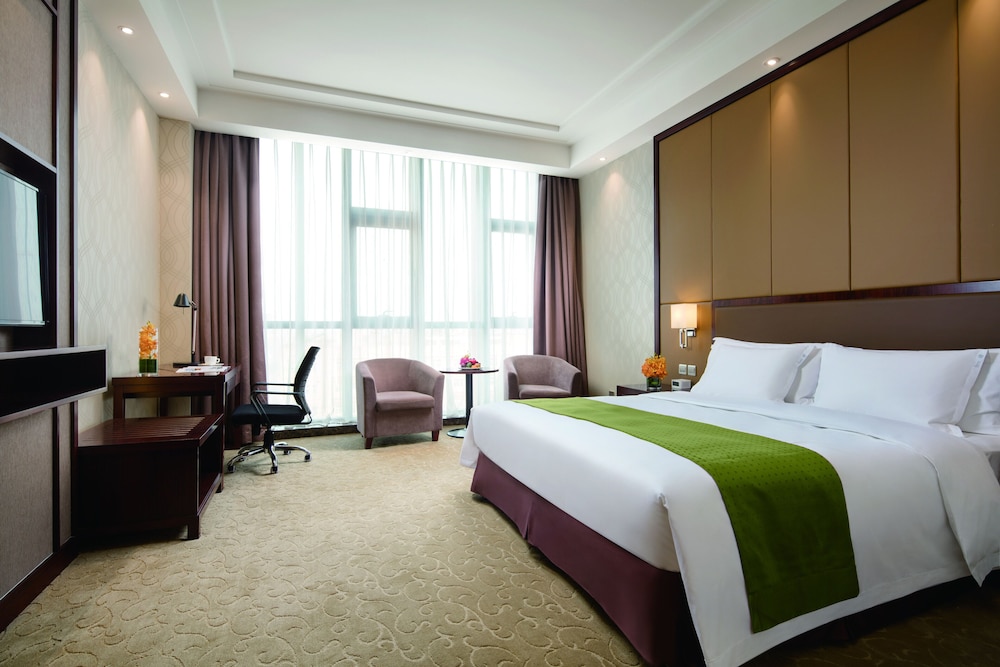 جناح بسرير كينج بمنطقة جلوس، HOLIDAY INN BEIJING AIRPORT ZONE 3/5