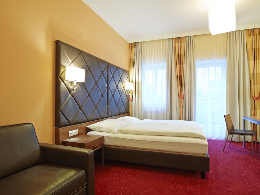 غرفة ثلاثية بسرير مزدوج وسرير فردي، Villa Ceconi By Das Grune Hotel Zur Post - 100 Bio 7/10