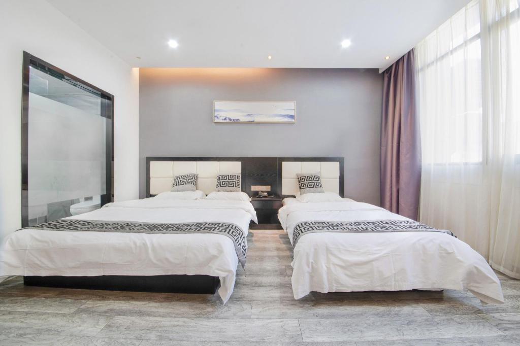 Room at Shell Wuxi Huishan District Wanda Plaza Yanqiao Subway Station Hotel, WUXI