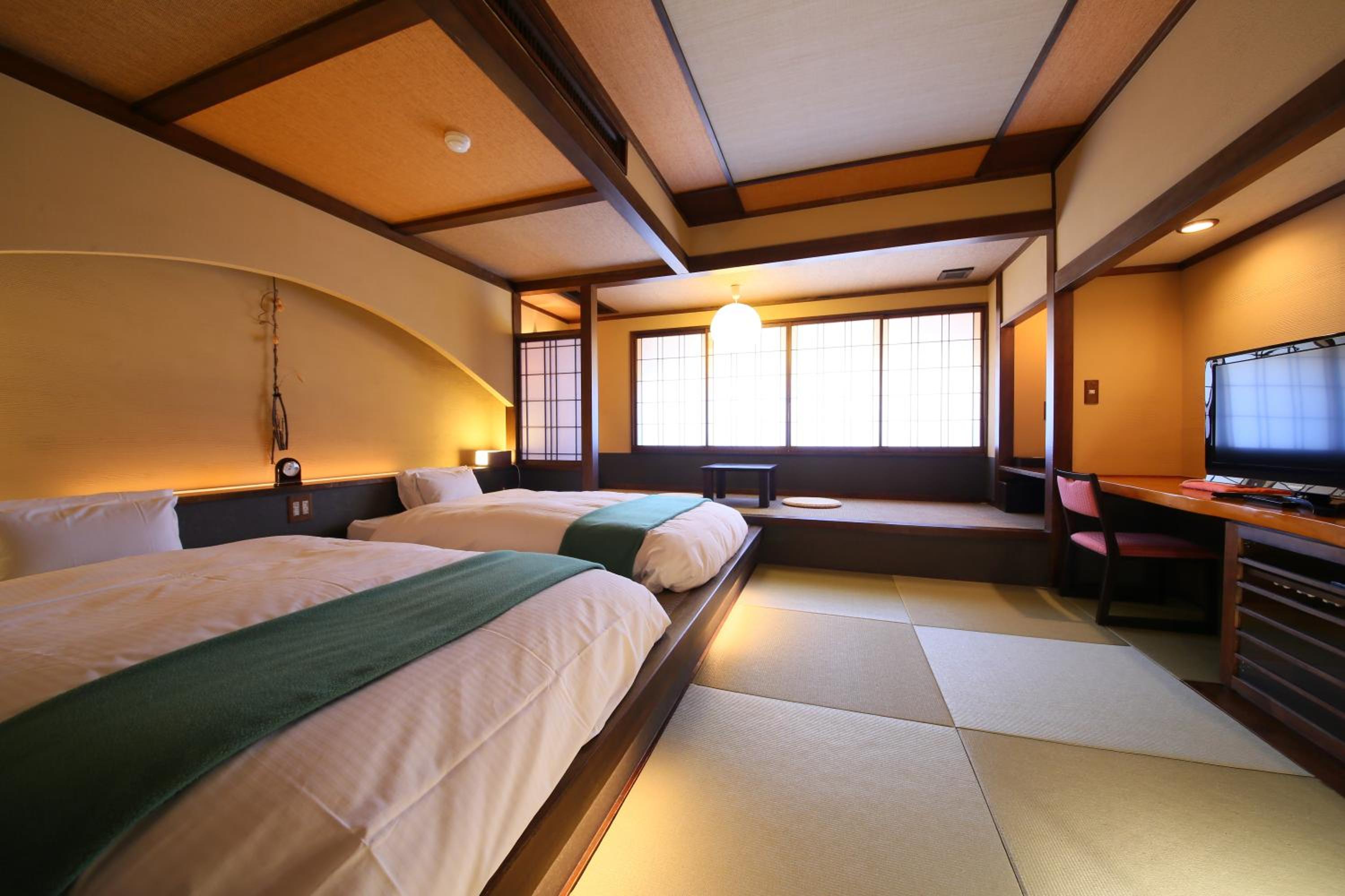 غرفة بسريرين منفصلين بأرضية تاتامي، Hotel Tamanoyu 5/10