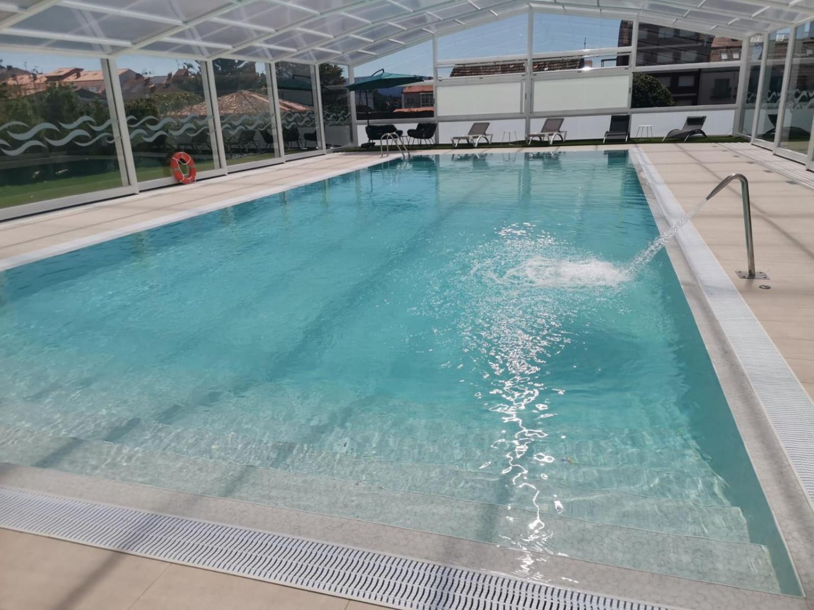 APARTAMENTOS LA TOJA 9/30