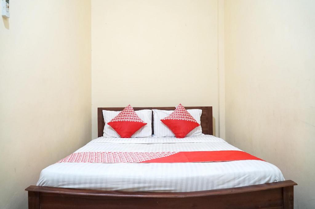 OYO 1034 Pondok Mulia Guest House 16/33