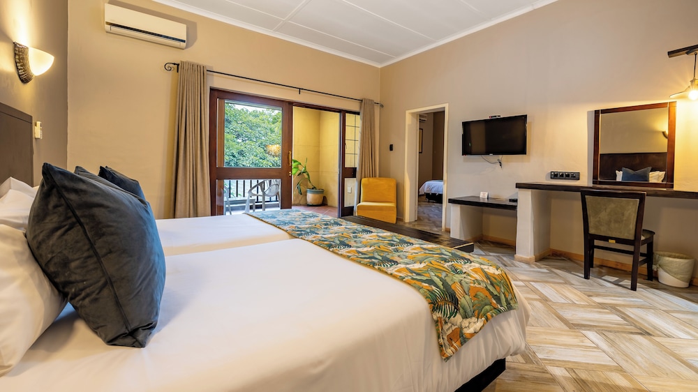 Hotel Numbi and Garden Suites 23/63