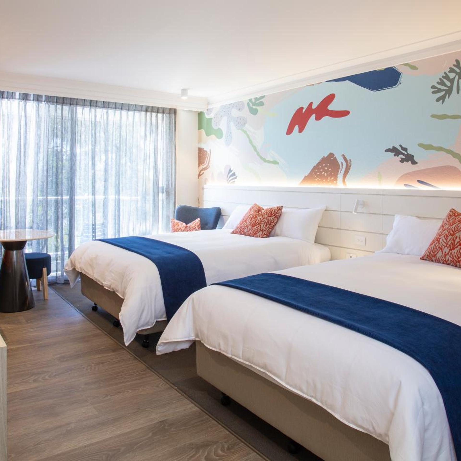 Deluxe Queen Room + Entry to 4 Theme Parks + Twin Pack of Wine