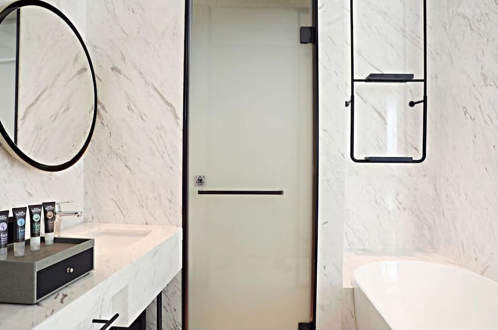 غرفة كلاسيكية بسرير كينج، Novotel Shanghai Wanyuan 5/7