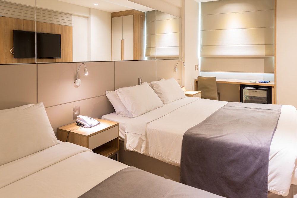 Deluxe, Triple, 1 Double and 1 Single Bed