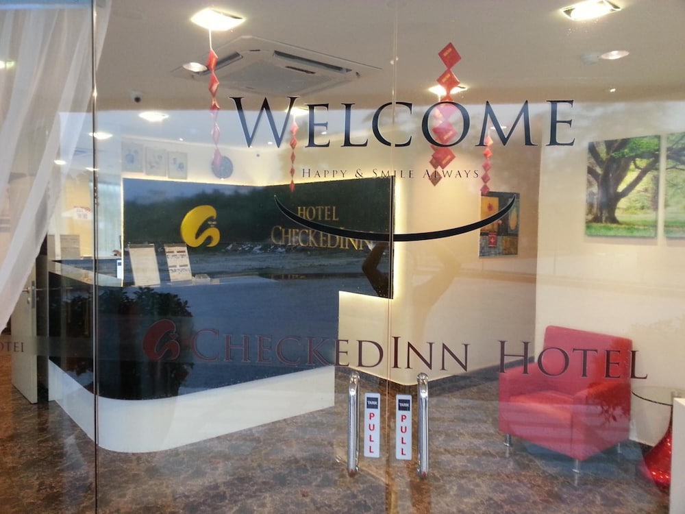 Capital O 90714 Hotel Checkedinn 9/38