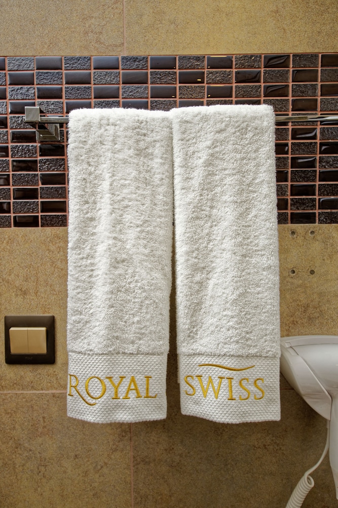 Royal Swiss Lahore 37/65