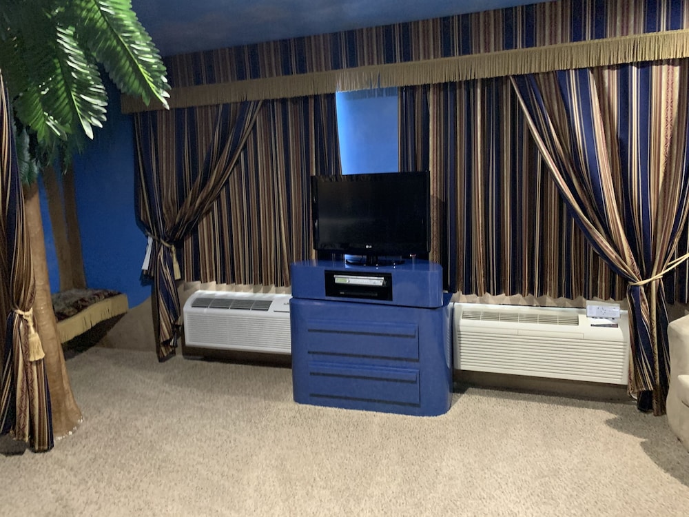 Designer Inn & Suites 10/69