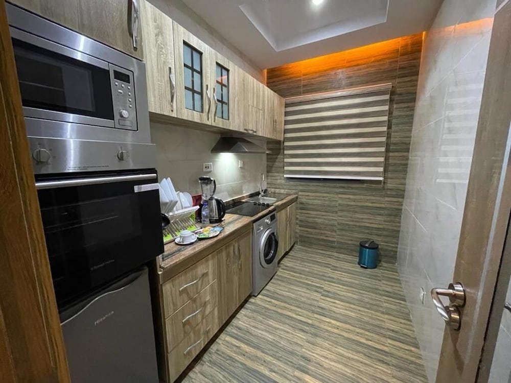God's Touch Apartments Signature 50/50