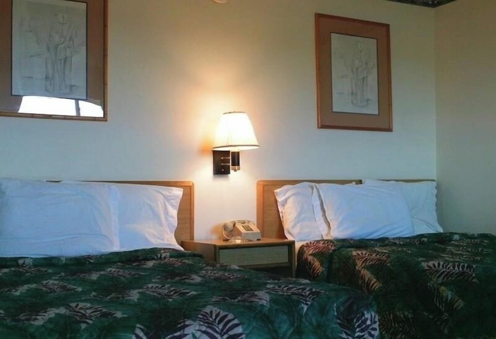 AMERICA'S VALUE INN MEXICO 21/23