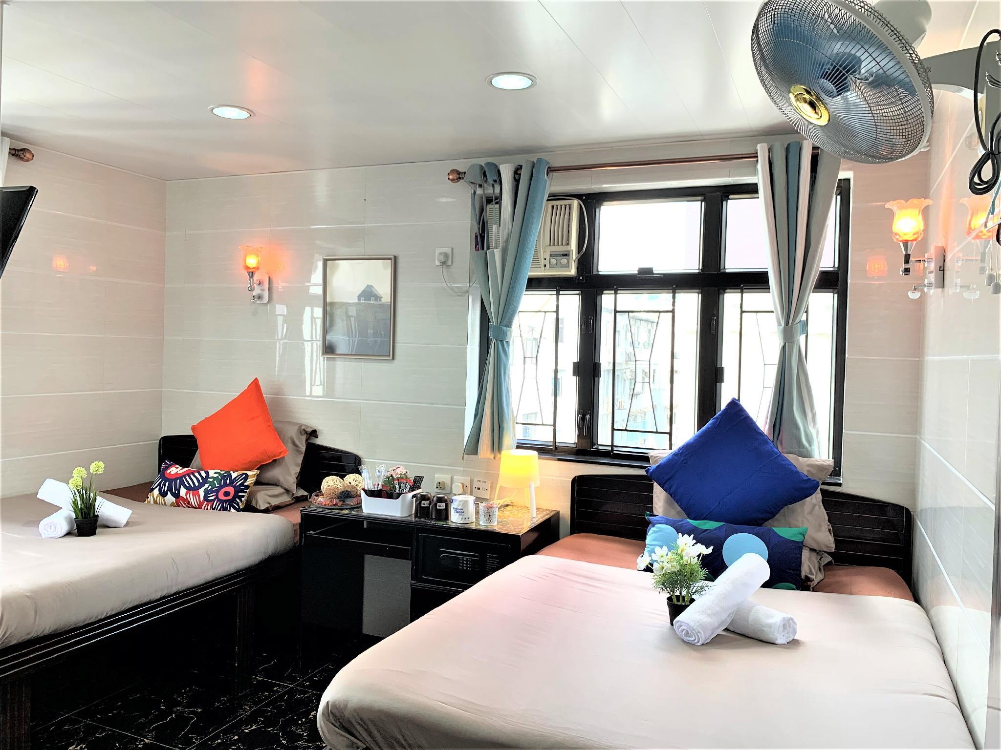 DELUXE, TRIPLE, 1 DOUBLE AND 1 SINGLE BED