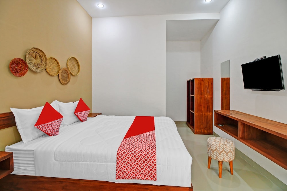 OYO 90820 Madania Guesthouse Syariah 12/23