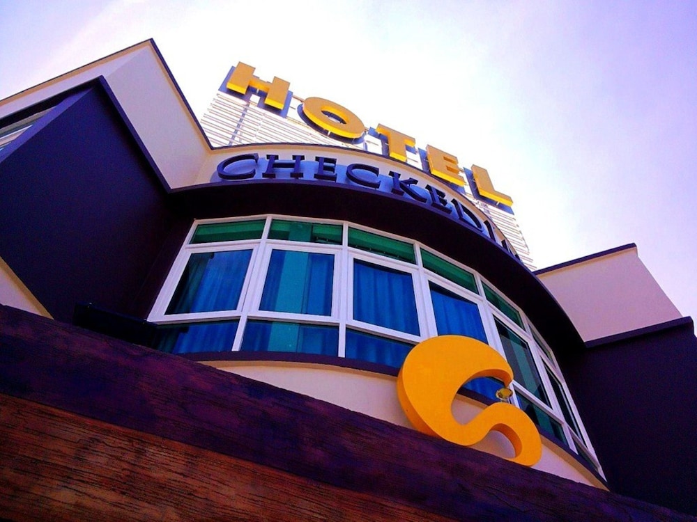 Capital O 90714 Hotel Checkedinn 1/38