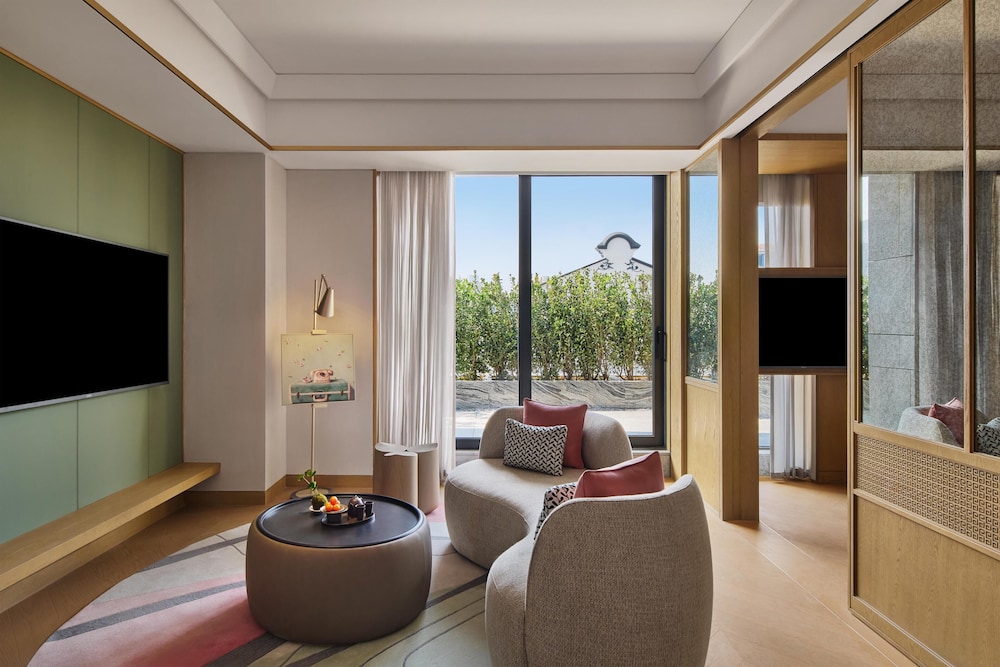 Xi Zhe Wuxi, Curio Collection by Hilton 24/36