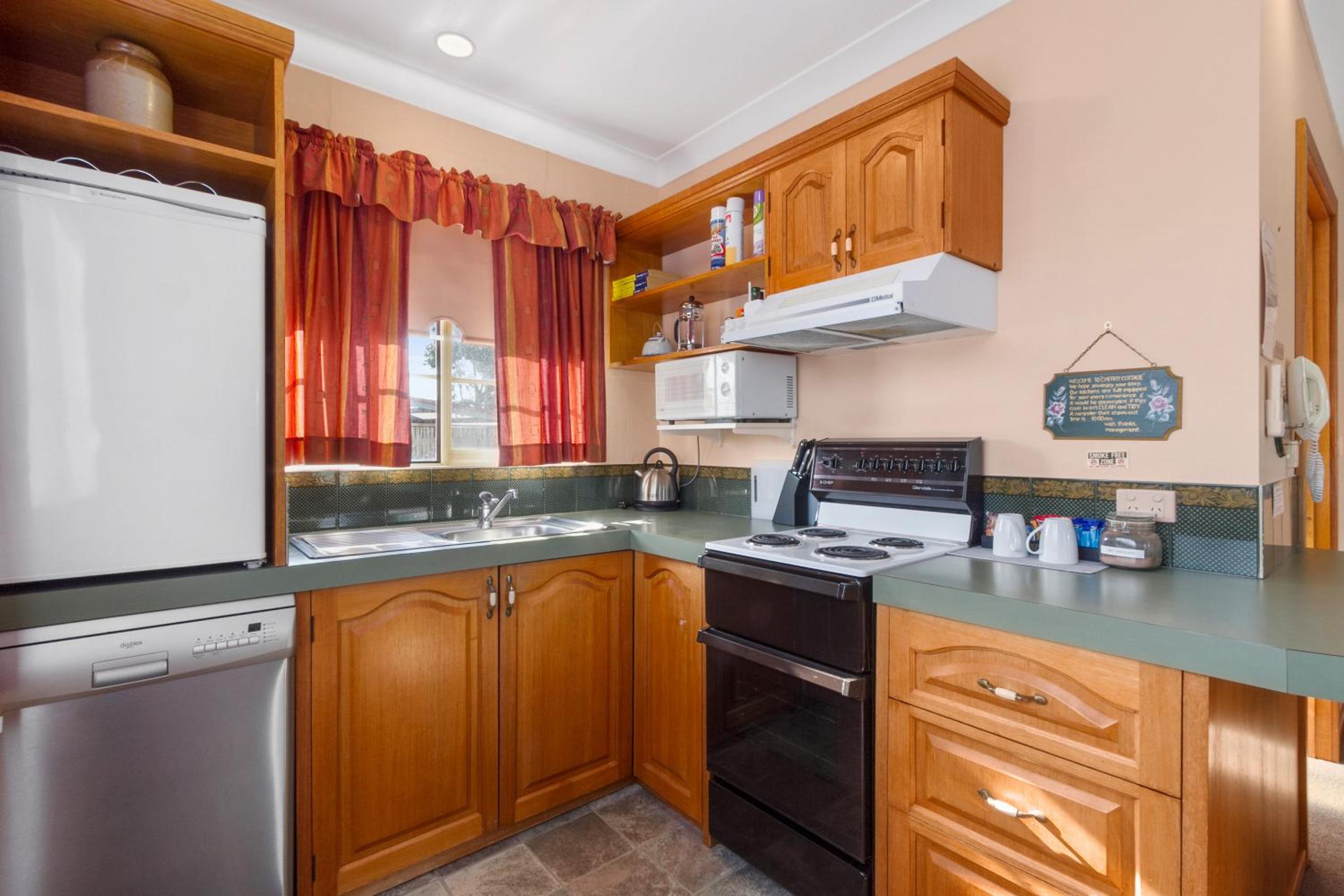 كوخ بغرفتي نوم، Swansea Cottages & Motel Suites 10/10
