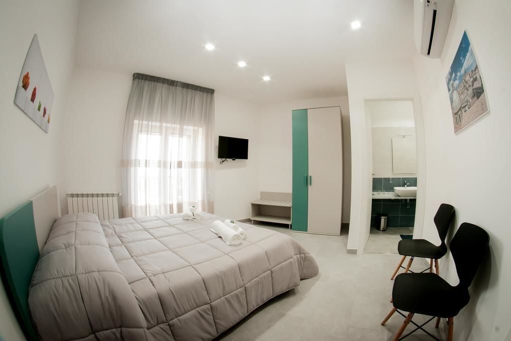 Standard, Triple, 1 Single and 2 Queen Beds