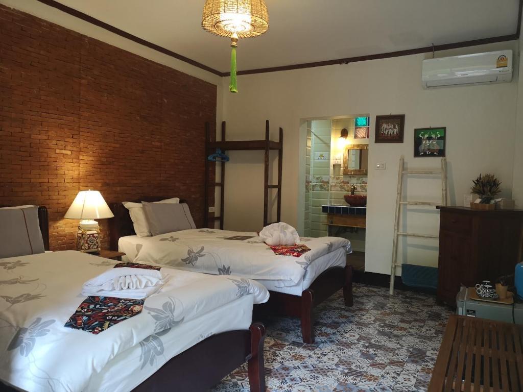 غرفة بسريرين منفصلين في الطابق الأرضي، Pao Come Boutique House 2/2