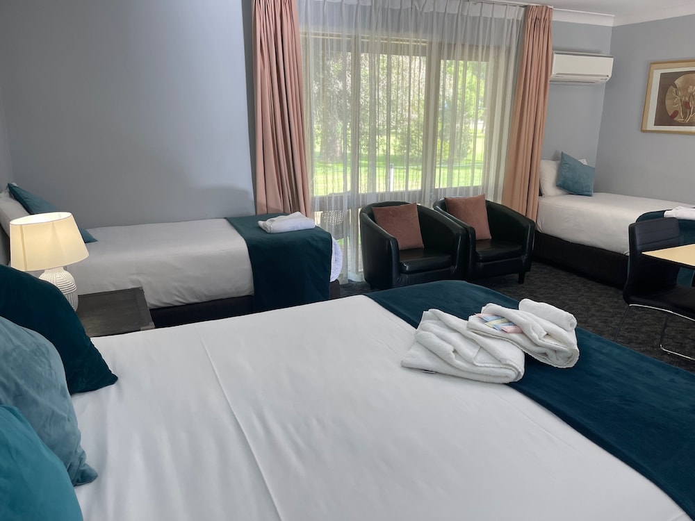 Deluxe, Quadruple, Queen and Twin Beds, Golf Course View