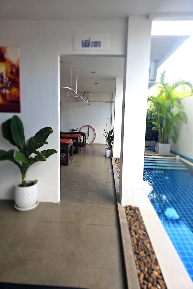 One World One Home Naiharn Hotel by ZUZU 29/50