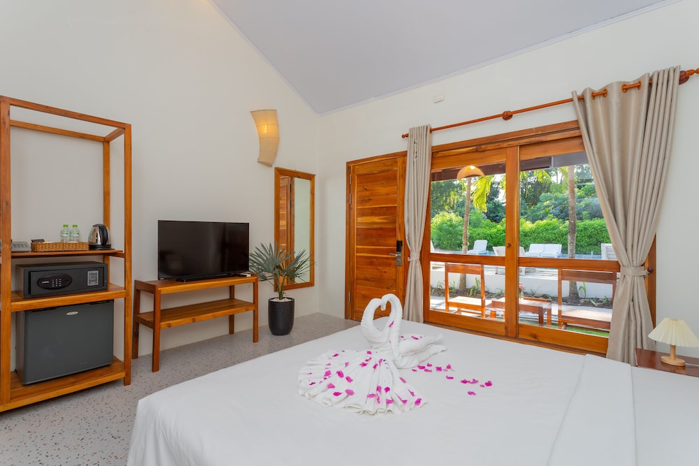 Signature, Bungalow, King Bed, Garden View, Garden Area، Bauhinia Resort 3/8