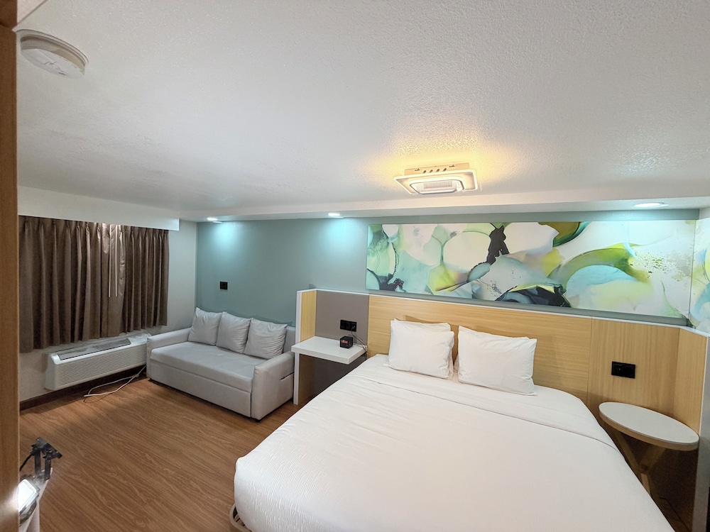 جناح ديلوكس بسرير كينج، Wyndham Garden Salina Conference Center 6/10